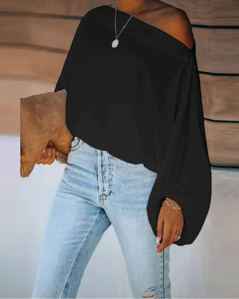 Lantern sleeve skew neck top