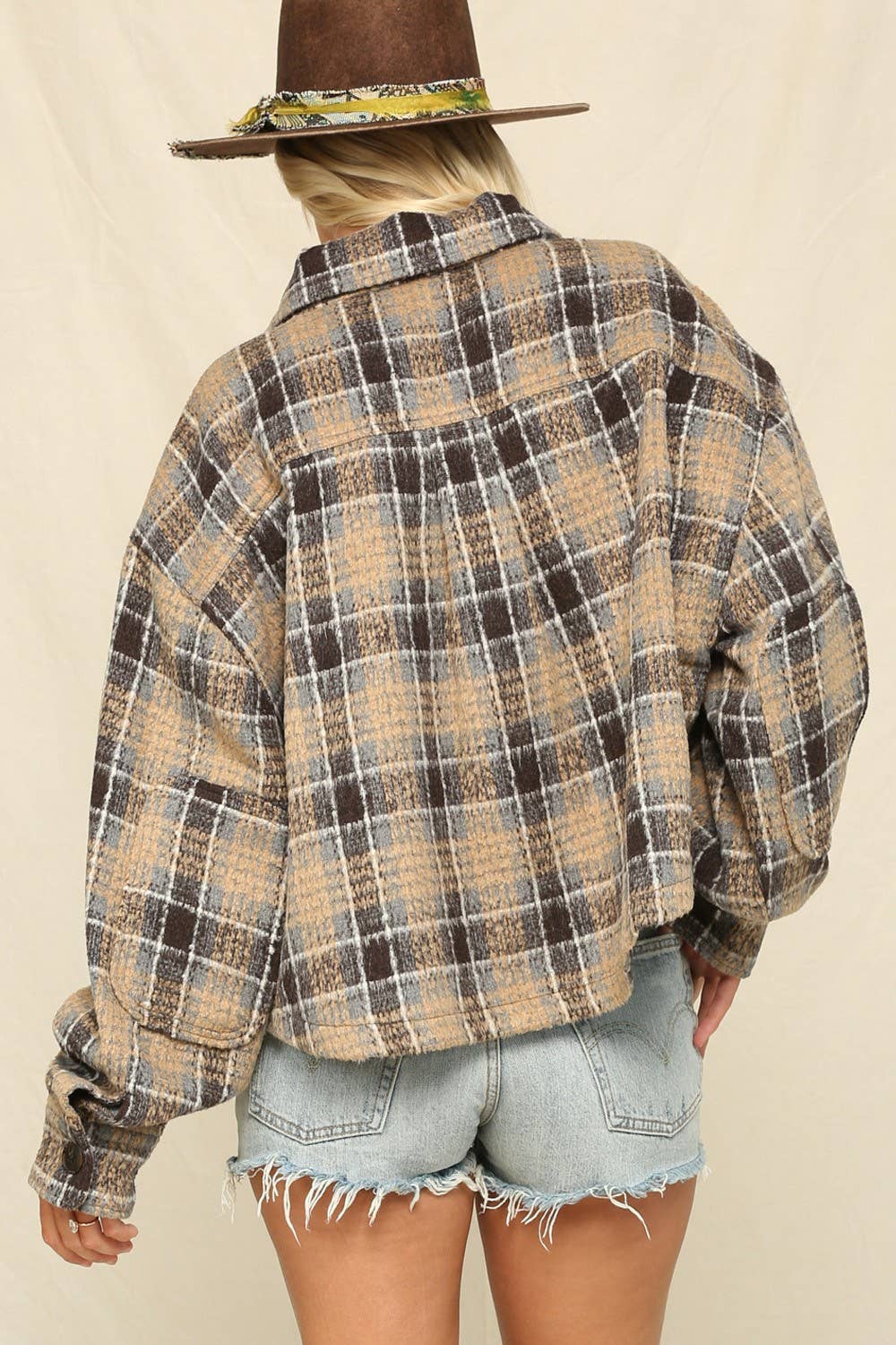 The Jacket Is A Boxy Cropped