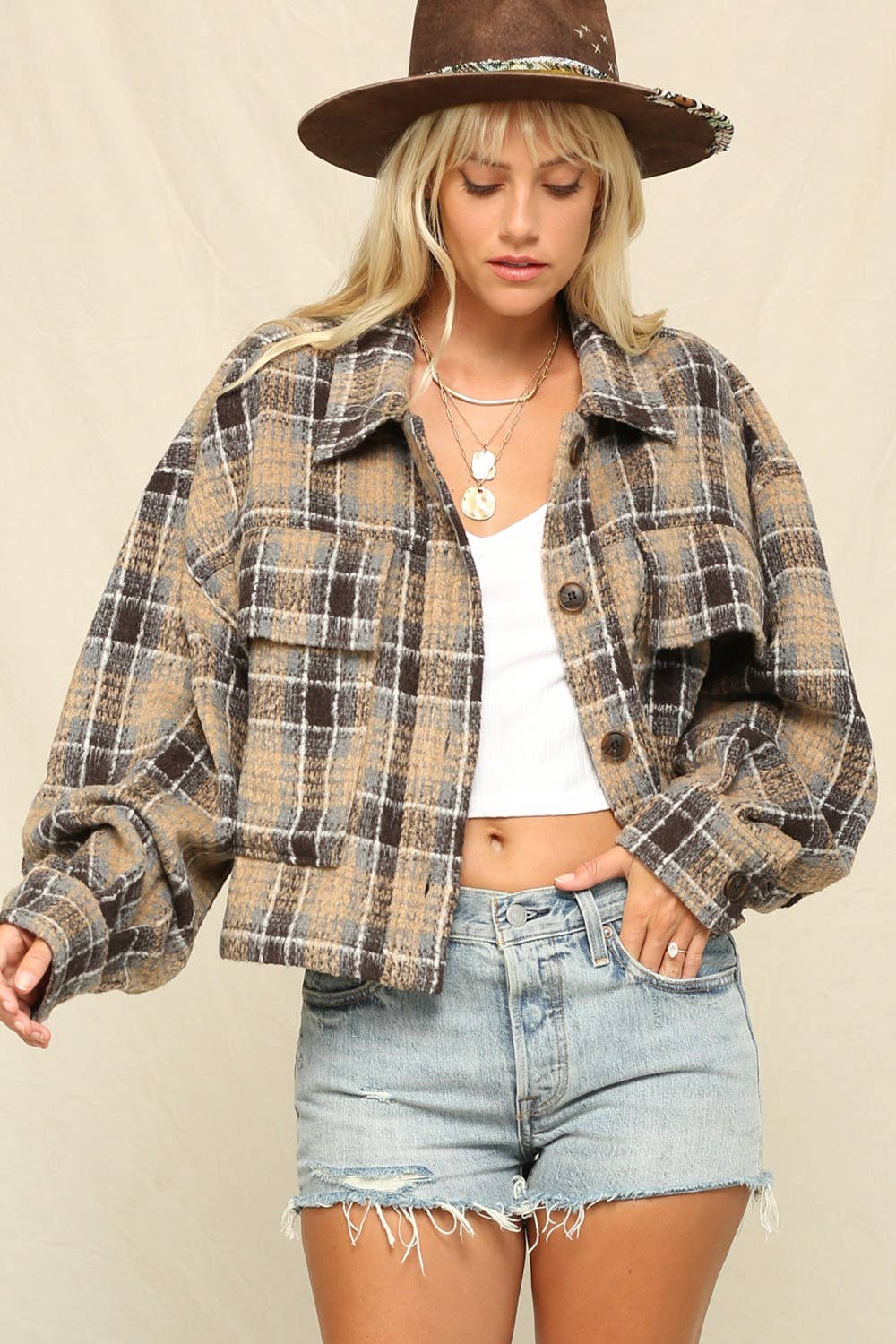 The Jacket Is A Boxy Cropped