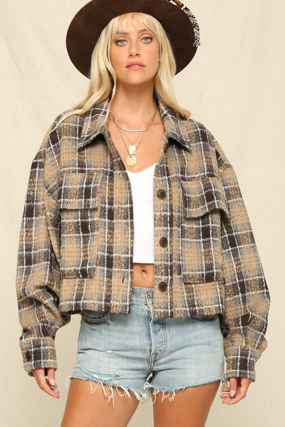 The Jacket Is A Boxy Cropped